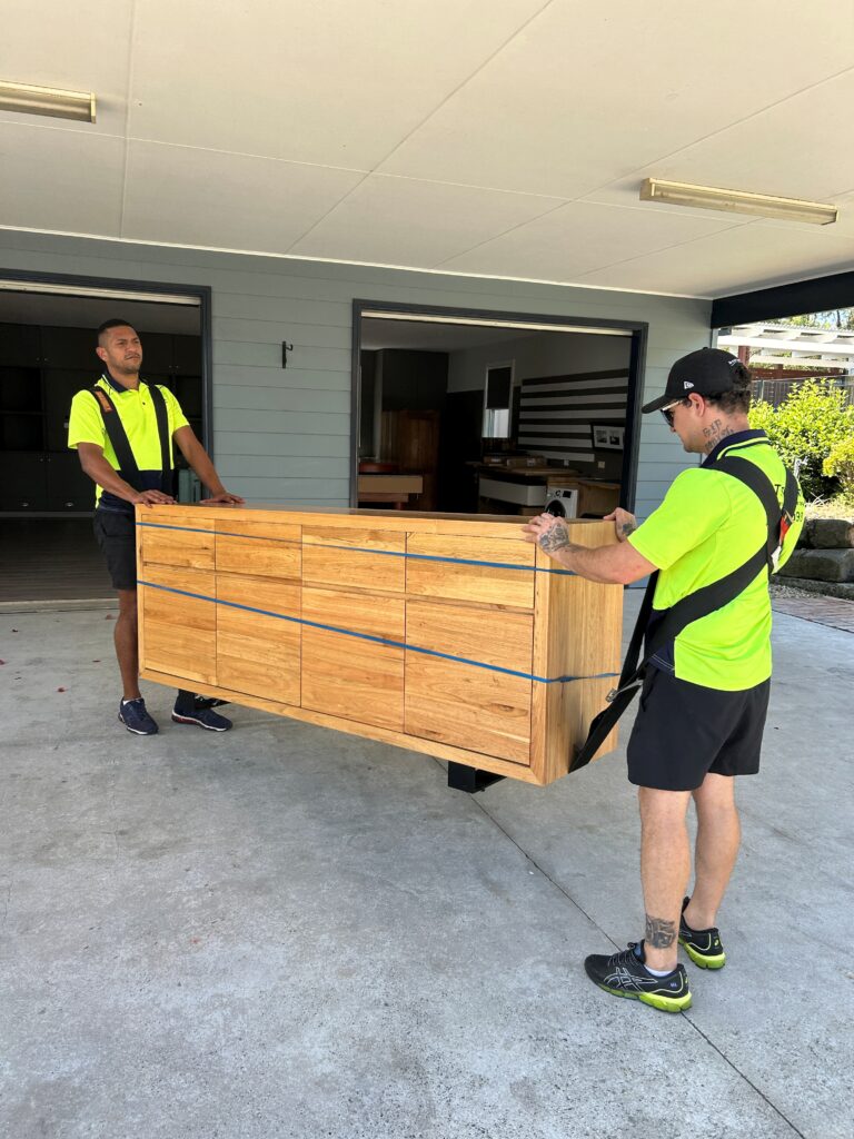 Heavy sideboard move with shoulder straps and bands on the draws